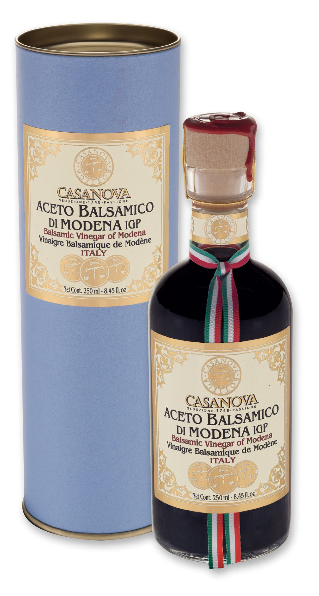 Italian Tube Aceto Balsamico di Modena IGP Qualità 6 250 ml Casanova, bottiglia con confezione cilindrica.